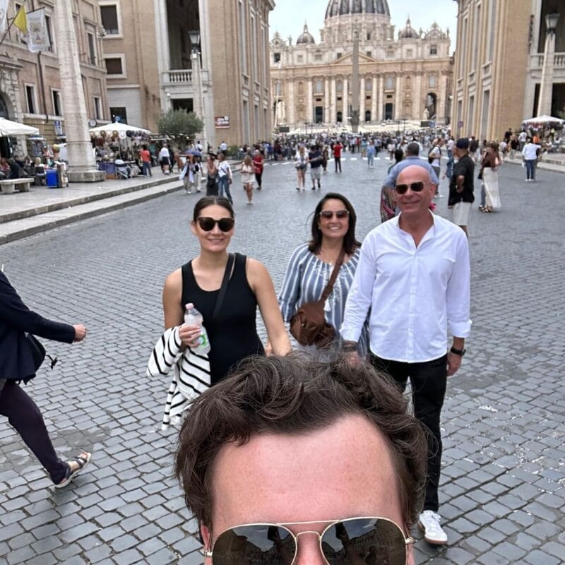 Group selfie in St. Peter's Square with St. Peter's Basilica in the background, Vatican City